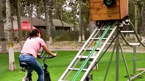 Mom works out while daughter has some fun in the playground