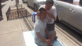 Luodong Massages Young Chinese Man On Sidewalk