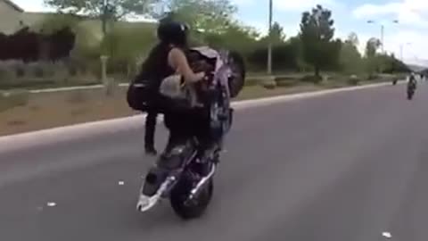 Girl riding a motorcycle