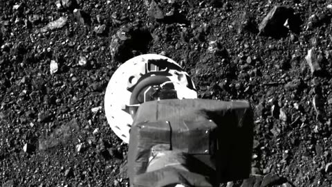 OSIRIS-REx Sample Collection at Asteroid Bennu: SamCam View of TAGSAM