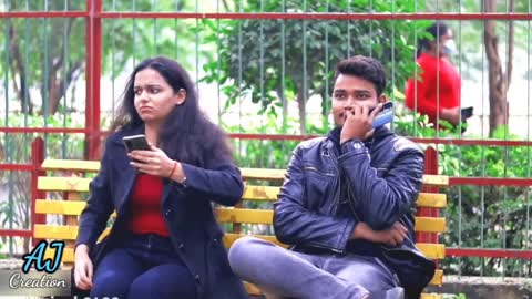 Girl Seated on a Ball Prank by the Boy Besides Her