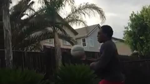 Basketball layup into kids hoop