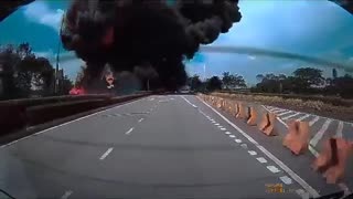 Captured on a car dashcam a private plane in Malaysia crashes