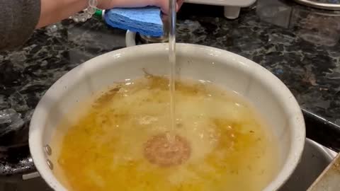 Watch as I remove the grease from this pan using only water!