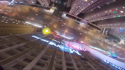 Crazy BASE Jump Off Skyscraper in Rain