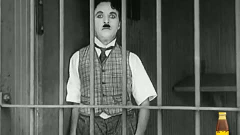 Charlie Chaplin- Lions Cage