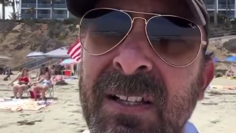 Pathetic Liberal Throws Fit After Seeing American Flags On Beach