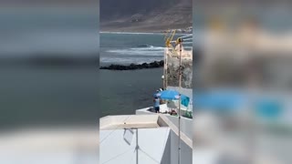 Man Fishes From Rooftop During Lockdown In Lanzarote