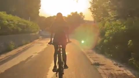 Cycling freely in the sunset