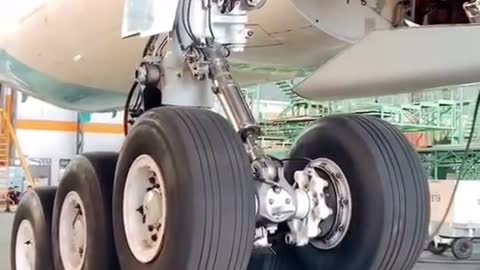 A close up look at the landing gear of an airplane