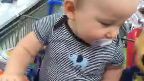 Baby reacts to his new furry friend