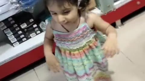 Cute baby girl acting like a star