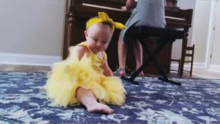 Cute Baby Reacts to 'Belle' on Piano