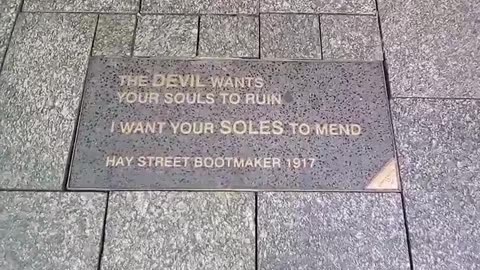 Spooky sign of shadow war between good and evil found underfoot in Hay St Mall