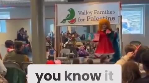 Drag queen "teaching" children a song called "free Palestine" and has them