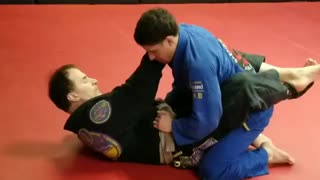 Omaplata to backstake to lapel choke