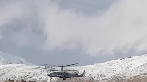 Russian KA52 Attack Helicopter Hovering Near the Syrian Border with Israeli Golan Heights