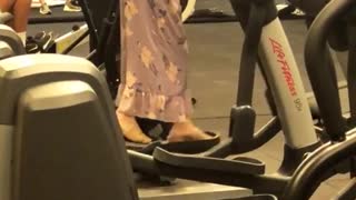 Woman dress romper gym elliptical heels blocks on feet