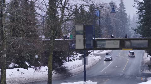 Snowing around a pedestrian bridge in Canada