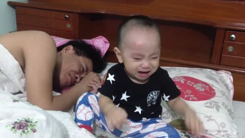Baby crying because of father