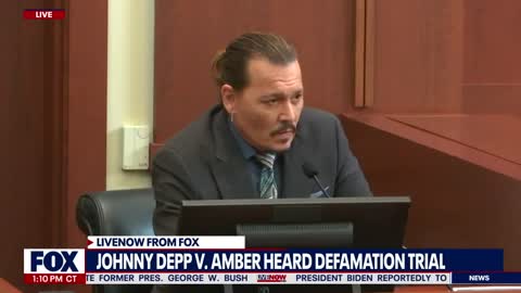 Amber Heard smirks as Johnny Depp confronted with photo contradicting abuse testimony