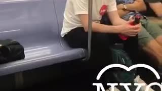 Everyone asleep on subway train