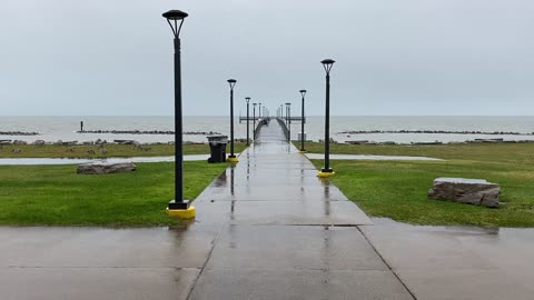 Relaxing Rainy Day at the Lake Pier with Birds and Waves