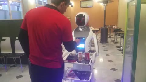 Robot Waitress Designed To Look Like Its Wearing A Hijab