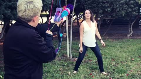 Girl Catches Rose Shot From Bow And Arrow In Mouth