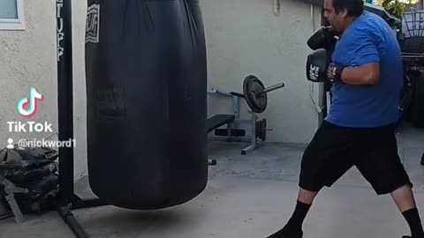 500Lb Punching Bag Workout Part 14. Muay Thai & Boxing work!