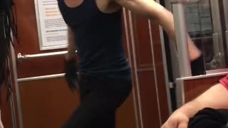 Bald guy blue tank top dancing on subway
