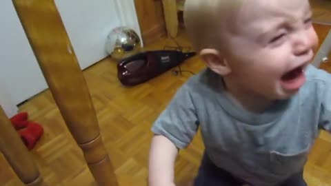 Baby Plays With Dustbuster, Freaks Out When It Turns On