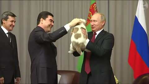 Putin smile to get the puppy present