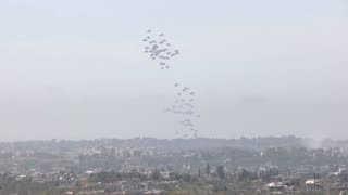 Pallets of aid are airdropped into northern Gaza