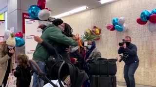 'No words': With travel ban lifted, families reunite