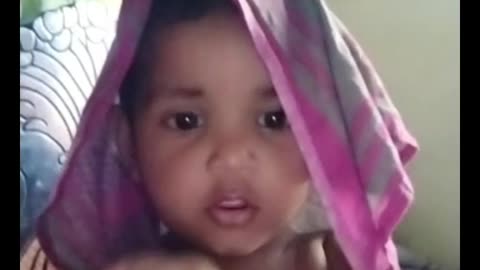 Cute baby playing alon with camera