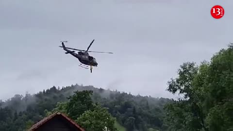 People evacuated by helicopters as floods hit Slovenia