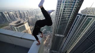 Spiders in Dubai: 1. High Rise Hand Stand/ 2. Climbing a Building from a Dead Drop Off