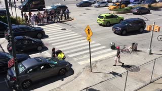 Driver and Cyclist Fighting in the Street. Police Break it Up.