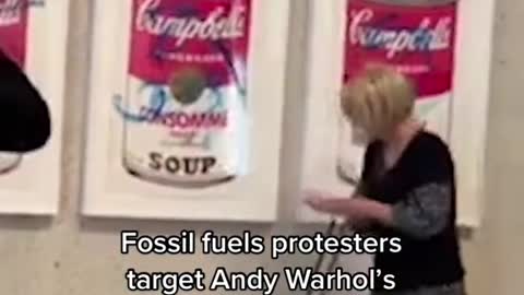 SOUYFossil fuels protesters target Andy Warhol's Soup Cans at Australian art gallery