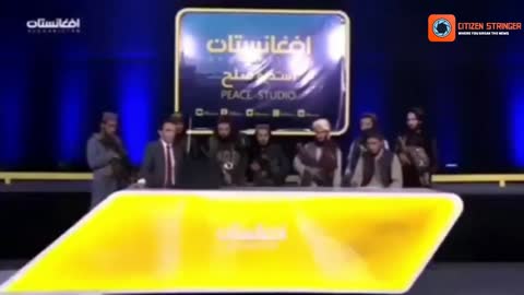 Afghan TV Host Tells Viewers not to be Afraid of Taliban while surrounded by the armed terrorists