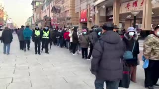 China's eager shoppers queue for Olympics mascot souvenir