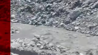 Moment floodwater rips through Italian town's riverbank. #Shorts #Flooding #Italy #BBCNews