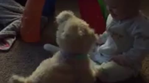 Mechanical toy puppy sends baby into laughing fit