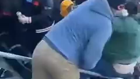 Packers fan gets tossed down the stairs at the Bears vs. Eagles game