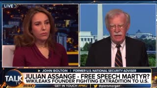 Julian Assange’s wife calls Bolton a war criminal to his face!