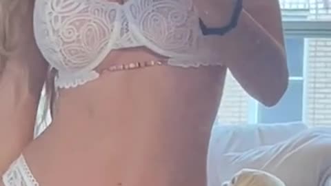 Leni Klum stuns in white lace lingerie for Instagram video