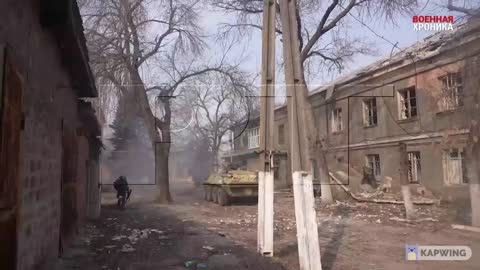 APC covers while evacuating wounded in Mariupol