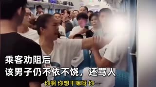 A woman on a high-speed train gripped a man's throat after he criticized Communist China