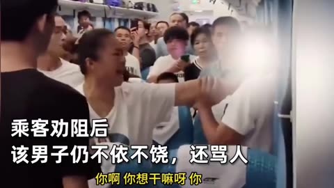 A woman on a high-speed train gripped a man's throat after he criticized Communist China